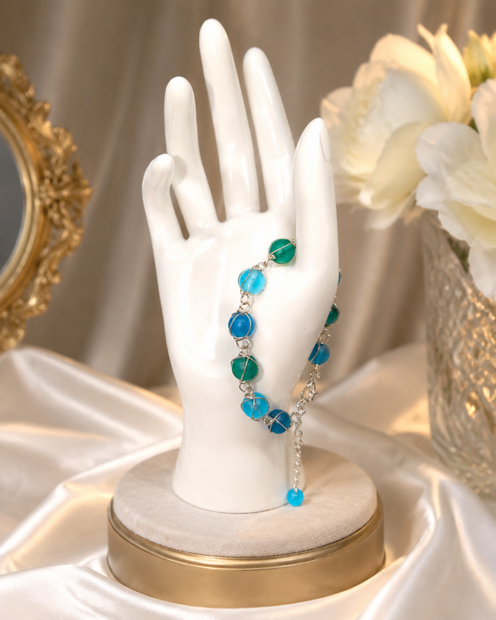 Royal sapphire moss bracelet with twisted wire design and round blue glass beads, adjustable fit